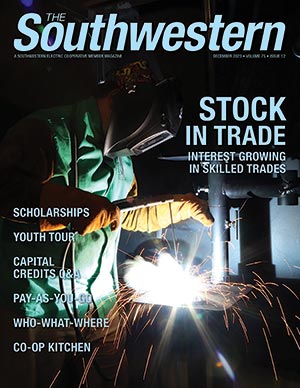 December 2023 cover image of student welding