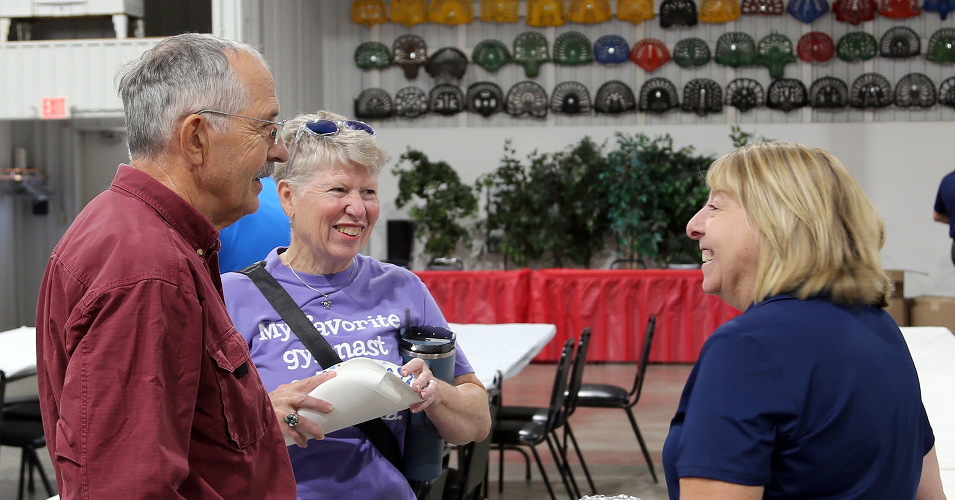 A Southwestern Electric director speaks with members at a past Annual Meeting.