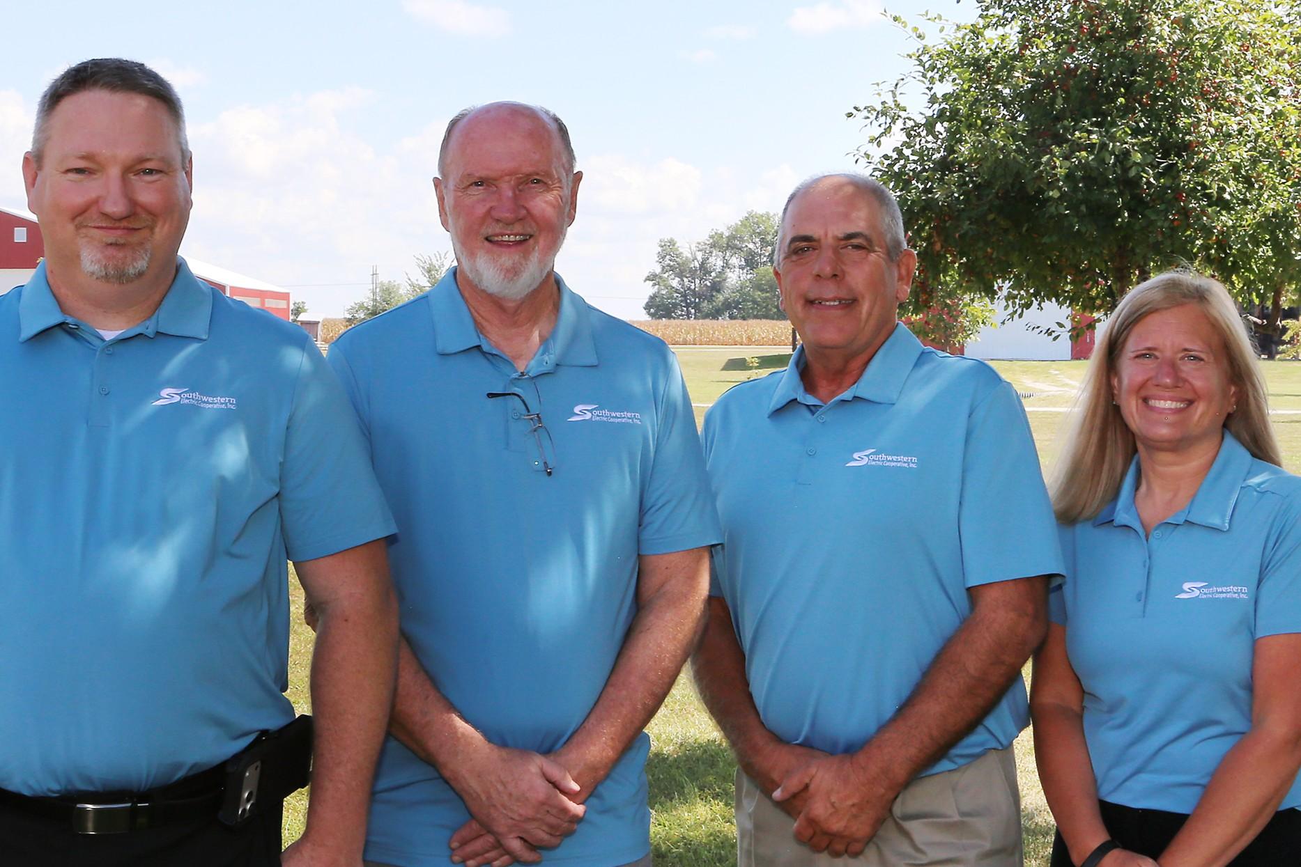 Southwestern Electric CEO Bobby Williams, left, stands with newly re-elected board members Marvin Warner of Pocahontas, Brad Lurkins of Greenville and Annette Hartlieb of Vandalia.
