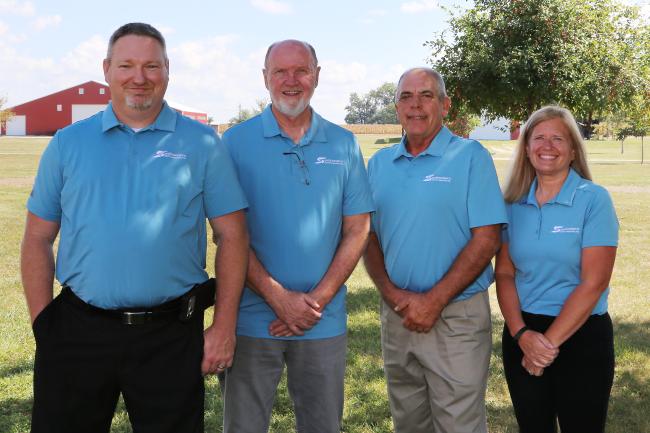 Southwestern Electric CEO Bobby Williams, left, stands with newly re-elected board members Marvin Warner of Pocahontas, Brad Lurkins of Greenville and Annette Hartlieb of Vandalia.