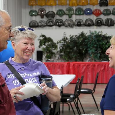 A Southwestern Electric director speaks with members at a past Annual Meeting.